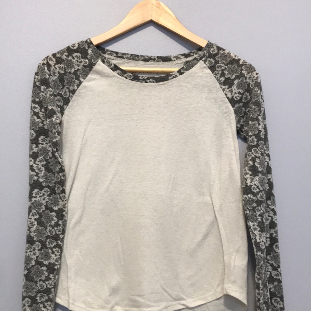 Long sleeve shirt with floral pattern on arms
